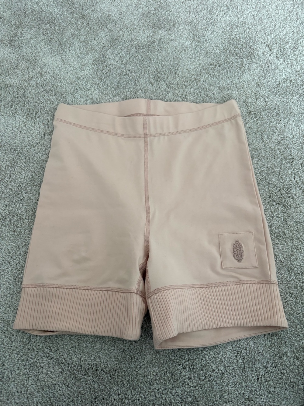 Free People High-Rise Ribbed Hem Bike Shorts in Blush